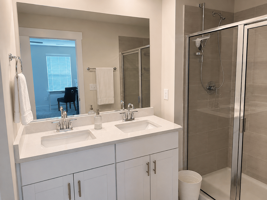 Private en-suite bathroom with double vanity & walk-in shower