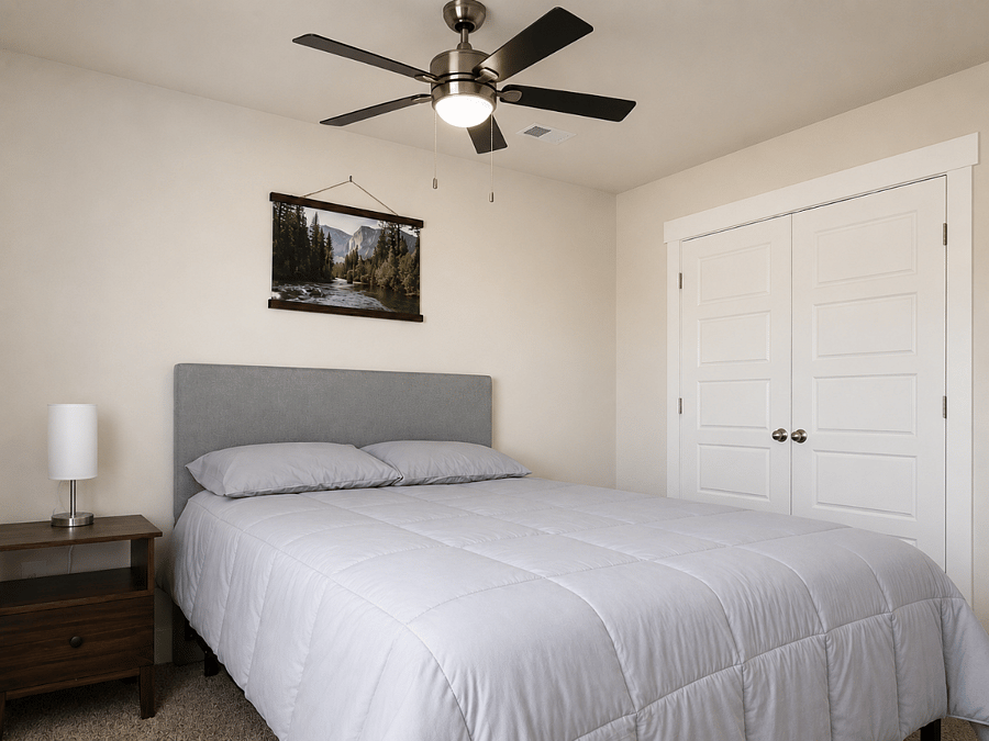 Comfortable full-size bed with Smart TV, closet & ceiling fan