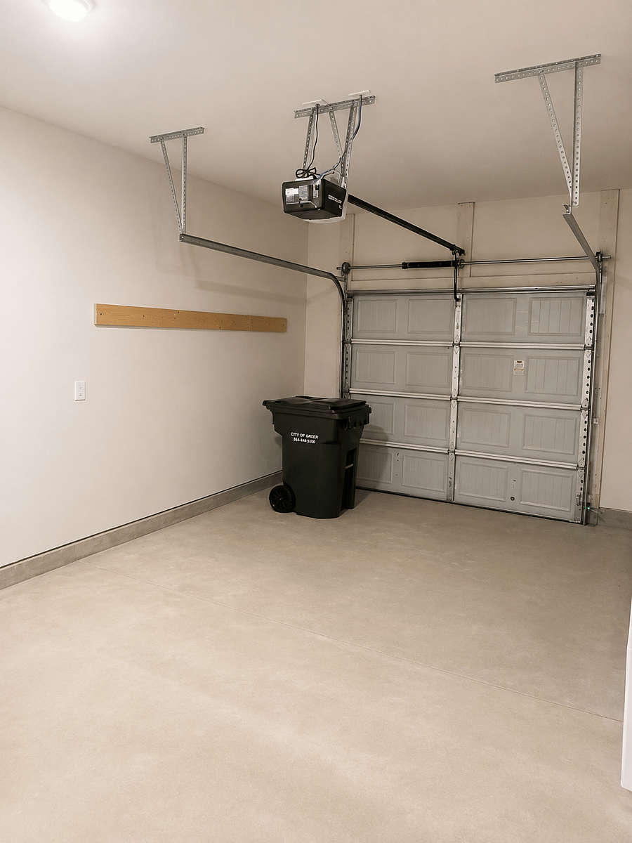 Private attached one-car garage with additional driveway parking