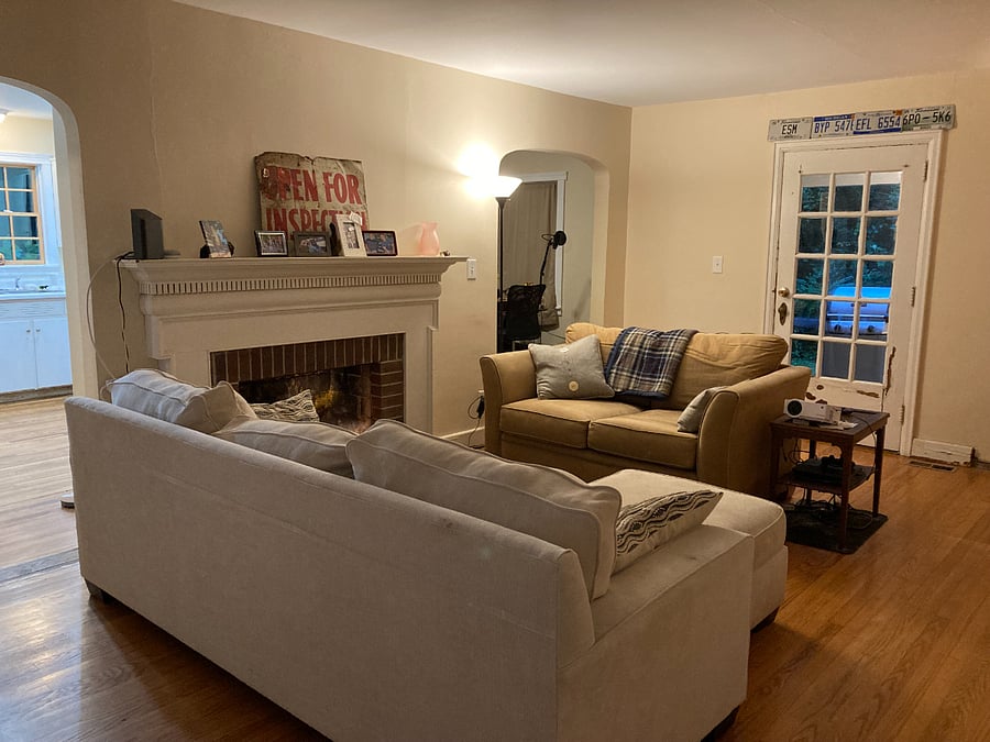 Living room (looking to kitchen, dining room, side porch)