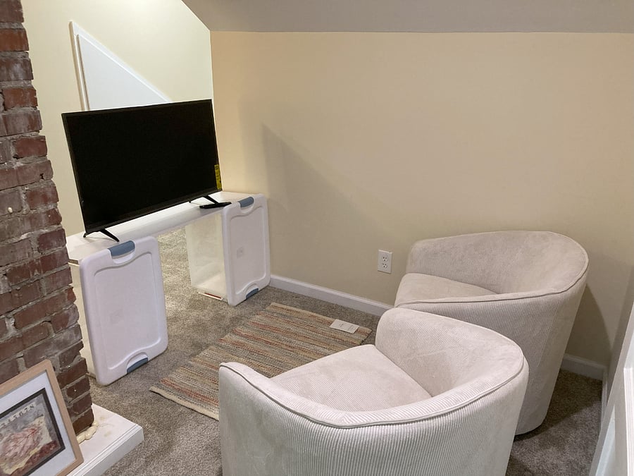 TV sitting area as seen from entry, prior to arrival of TV table