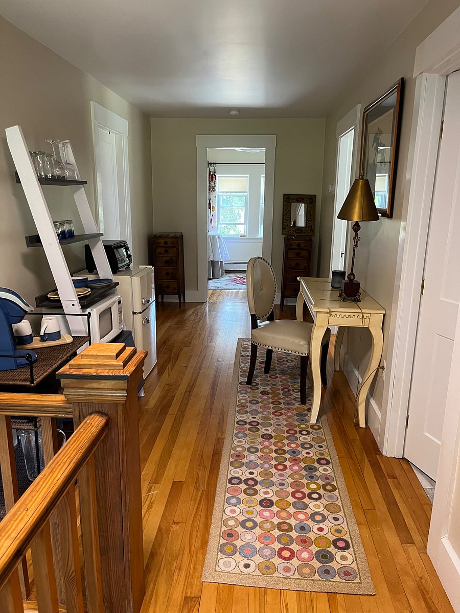 Kitchenette with microwave, toaster oven, coffee maker and refrigerator