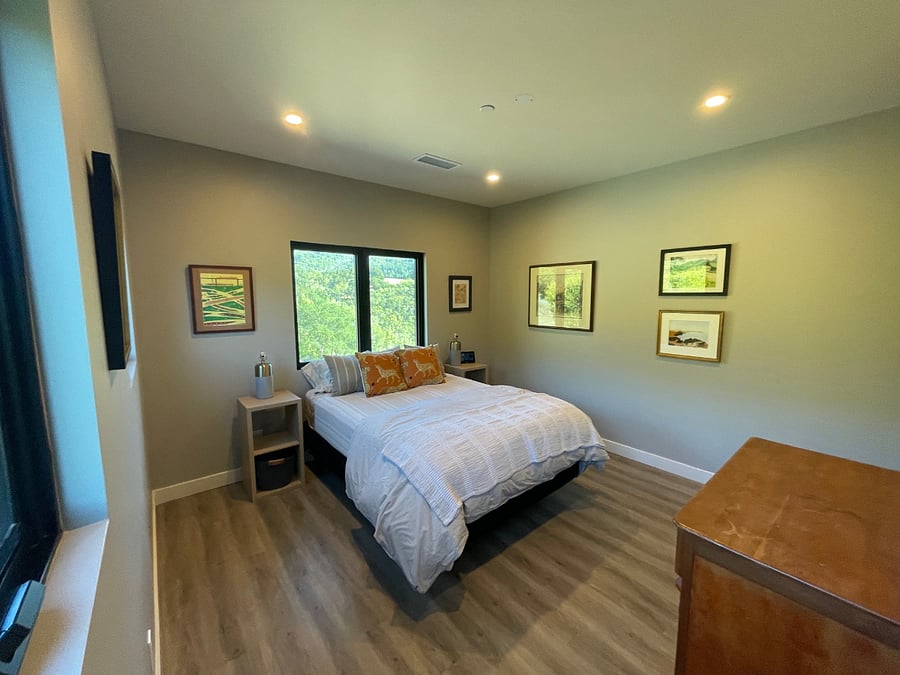 Bedroom with new queen size mattress and foundation.