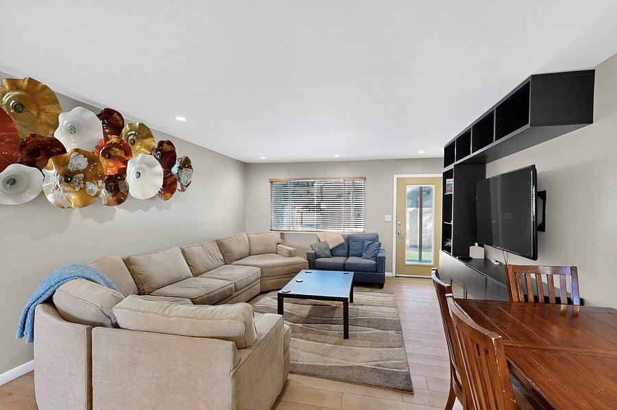 Comfortable living room with Smart TV, table