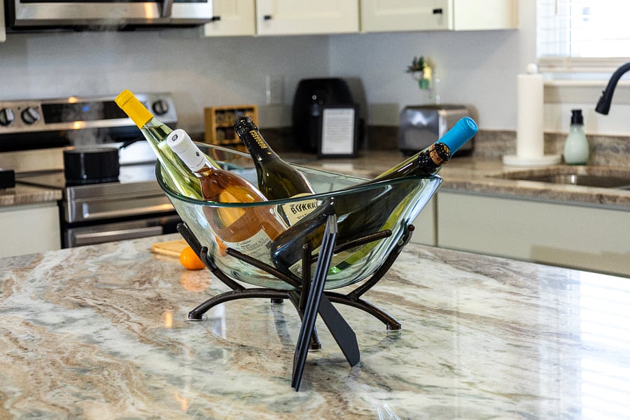 Your stay is stocked. Enjoy a glass of wine at the island.