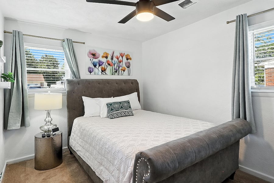 A comfortable queen bed awaits, promising a great night's rest after a long day.