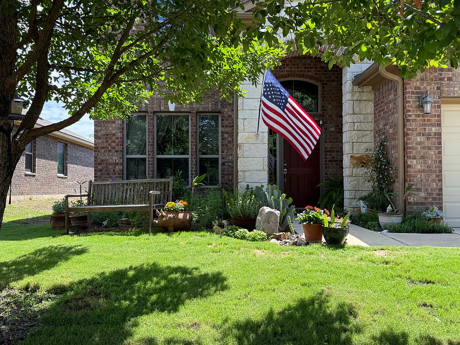 Front yard with bench
