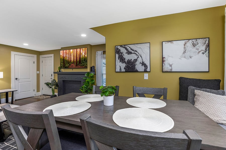 The bar-height dining table seats 4 comfortably.