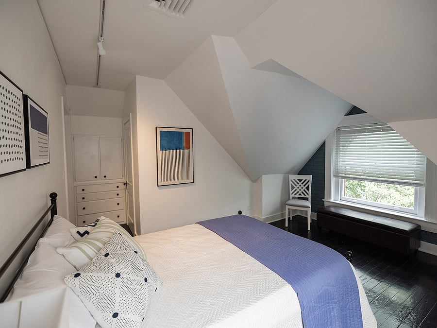 Bedroom with large closet and built-ins