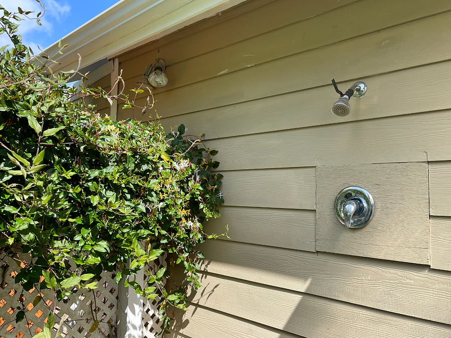 Outdoor shower with honeysuckle