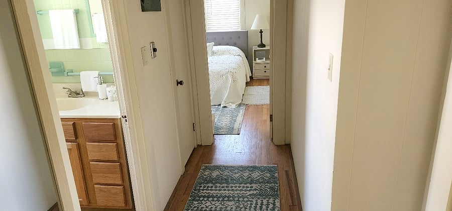 Hall to full bath and Master bedroom