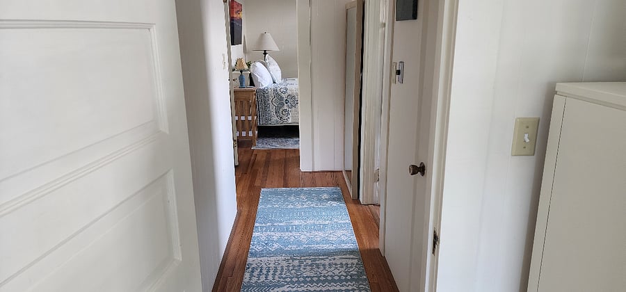 Hallway from Master bedroom to full bath and second bedroom