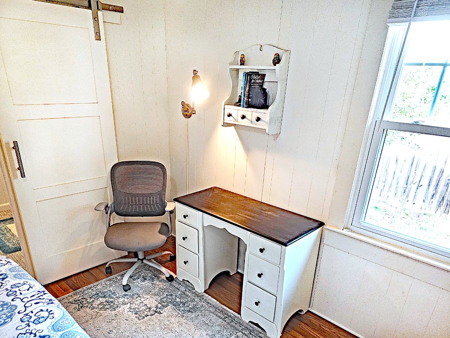 Quiet workspace, window overlooking backyard