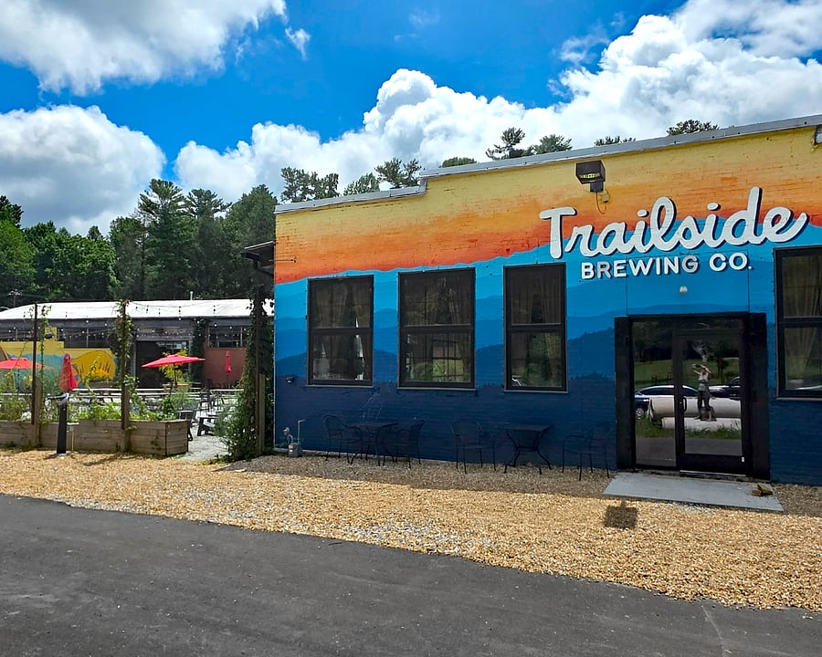 Exterior of Trailside Brewery with large outside courtyard/music space to the left