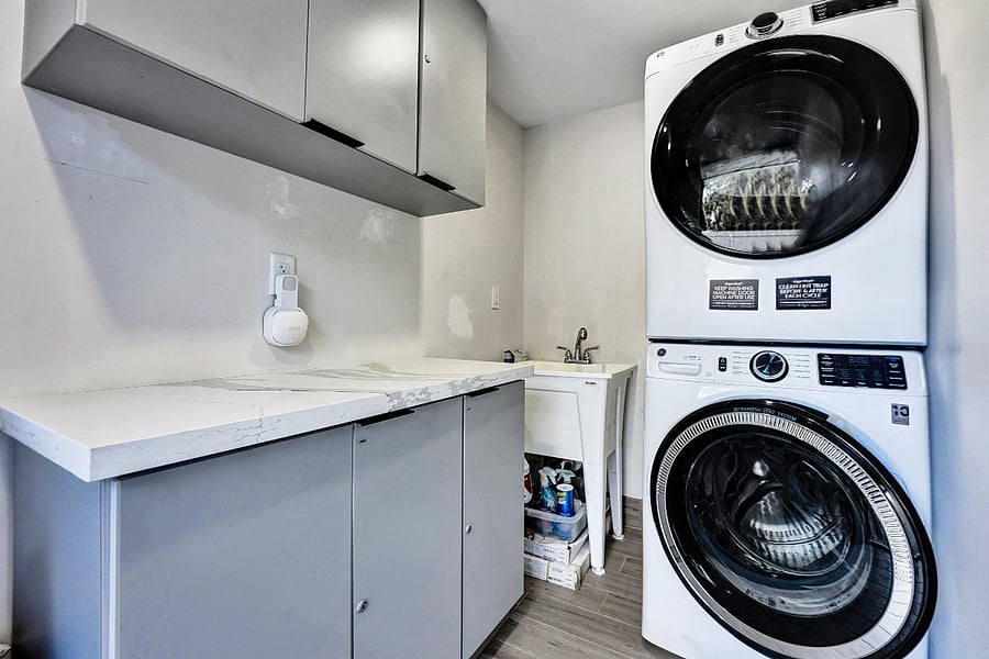On-site laundry room with washer and dryer
