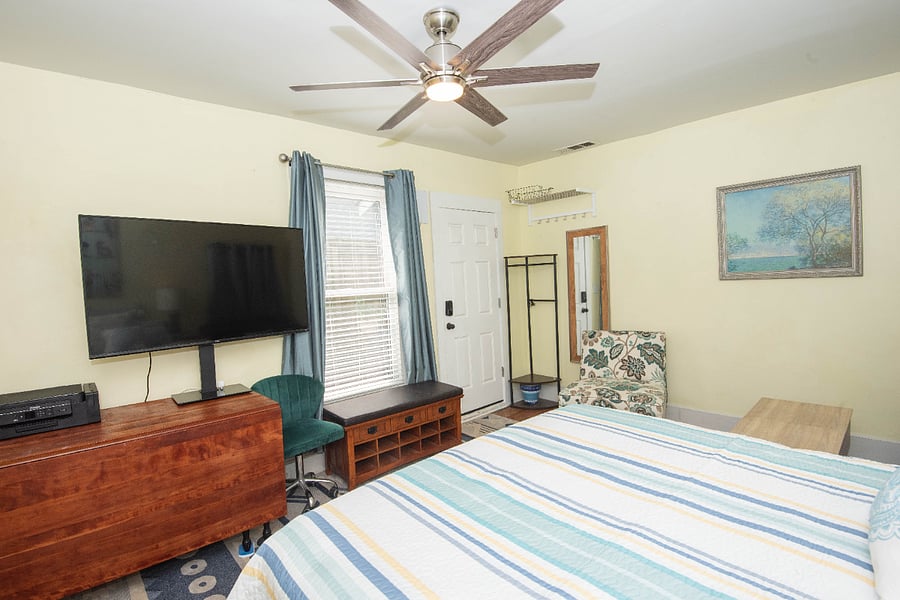 TV, table and printer for a dinner or a office space