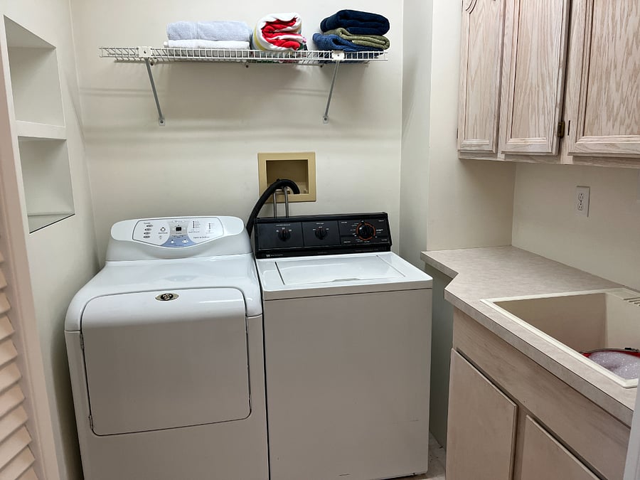 Private Laundry room with washer & dryer plus sink!