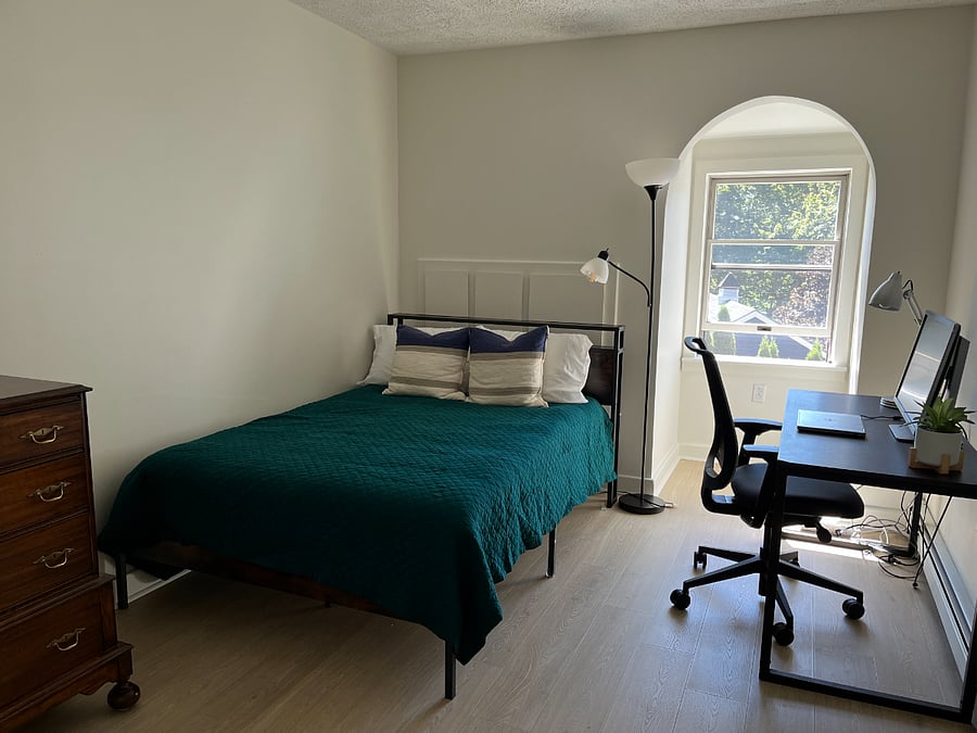 Second bedroom has new full bed plus can be set up with monitor and desk for office.  Natural light.