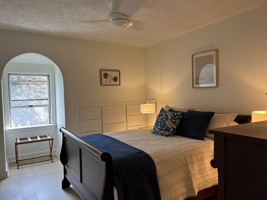 Master bedroom with ceiling fan; light.