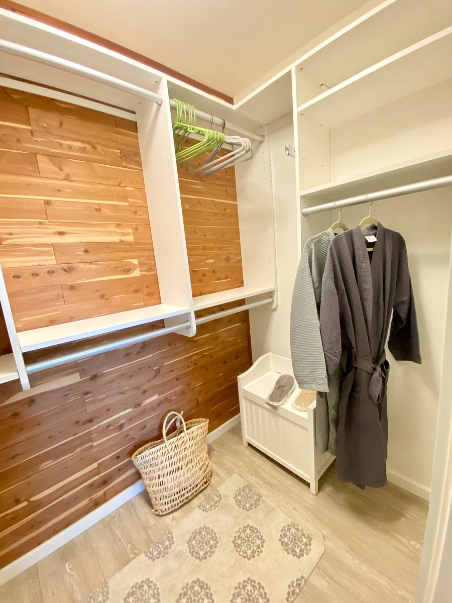 master bedroom walk in closet, cedar lined with shelf organizer robes and slippers too