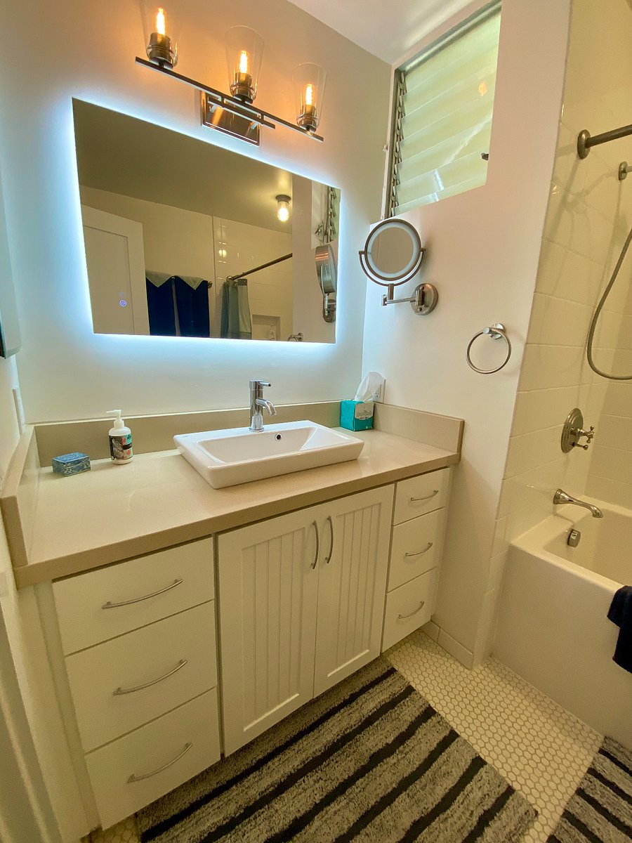 Antifog mirror, step in soaking tub and plenty of storage space