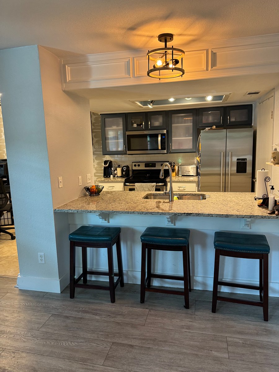 Kitchen area and bar seating