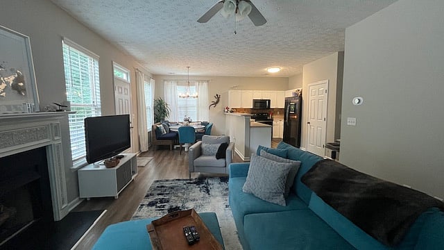 Open floor plan for the living, dining, and kitchen areas