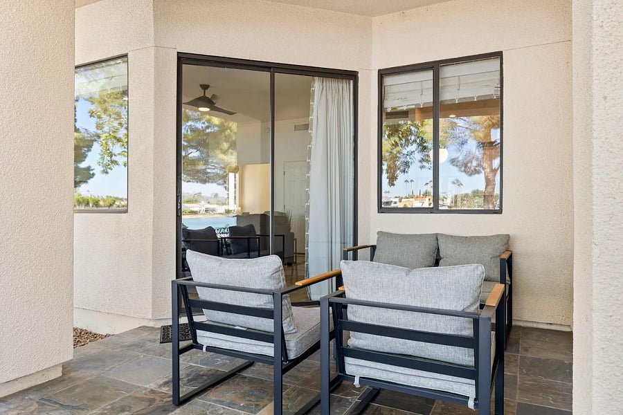 Lakeside private patio with seating for four + table. A front seat view to the most amazing sunsets you may ever see...