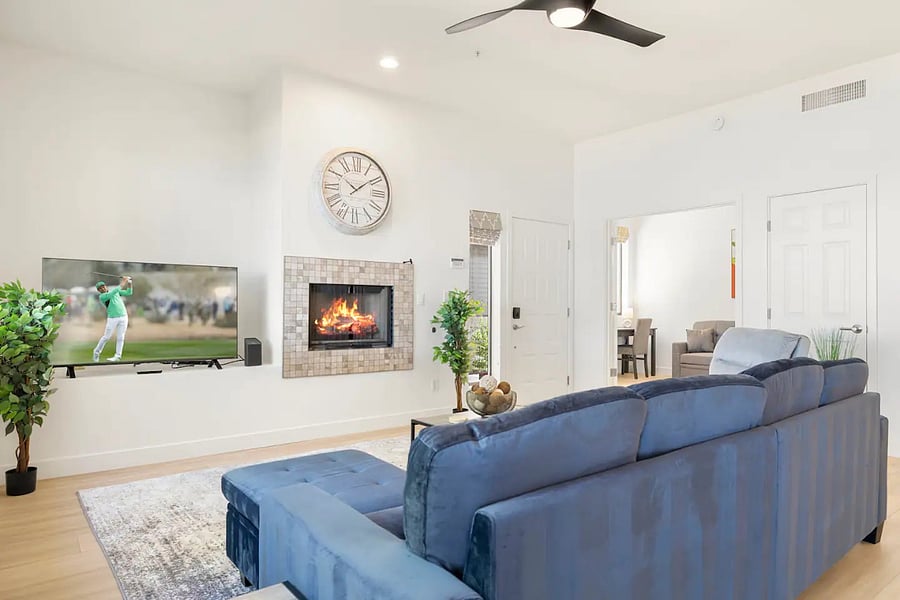 Family room with view toward the entrance door with office / den adjacent to the front door.