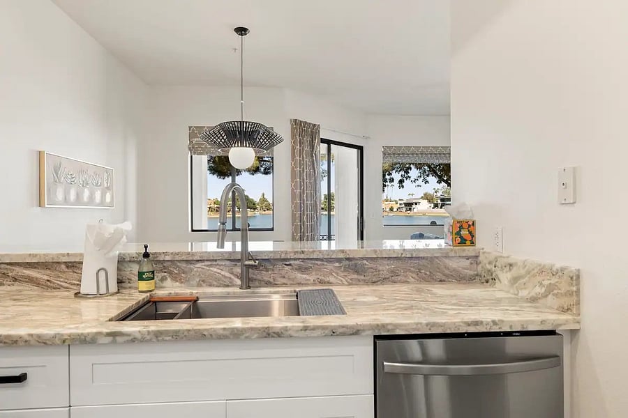 View of dining area and lake from the kitchen