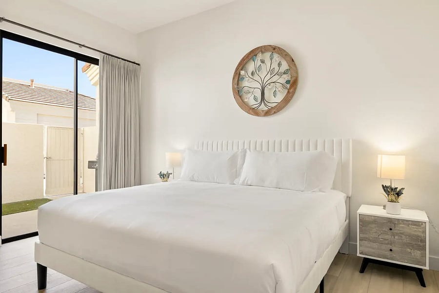Main bedroom with King bed. Private patio is to the left in this picture