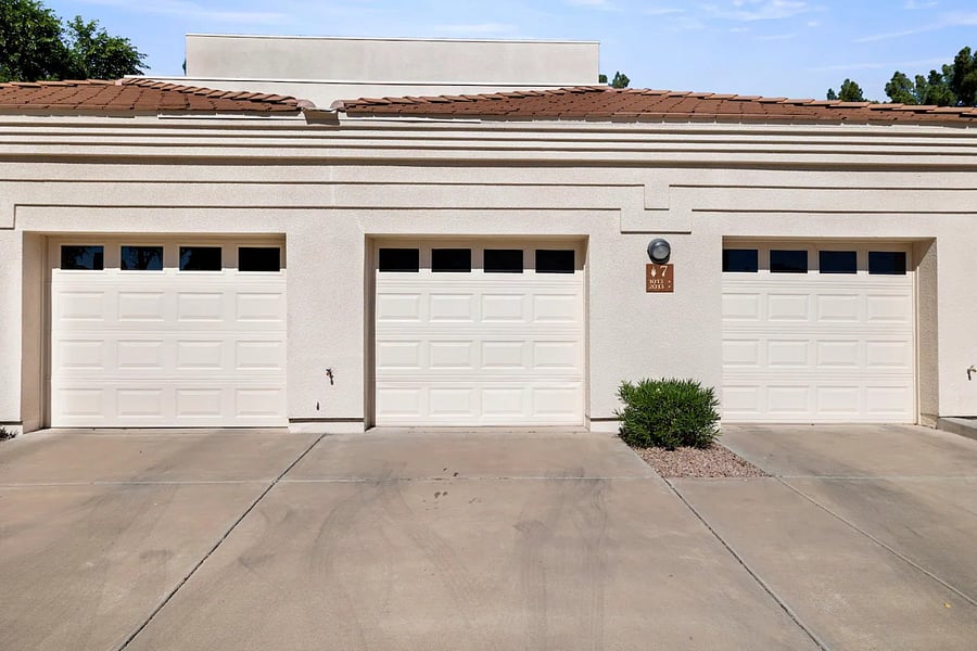 One car garage and room for one car on the driveway. Just across the street is public parking for your guests and the gated swimming pool / spa.
