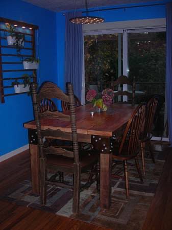 Formal dining room with doors to the back yard.