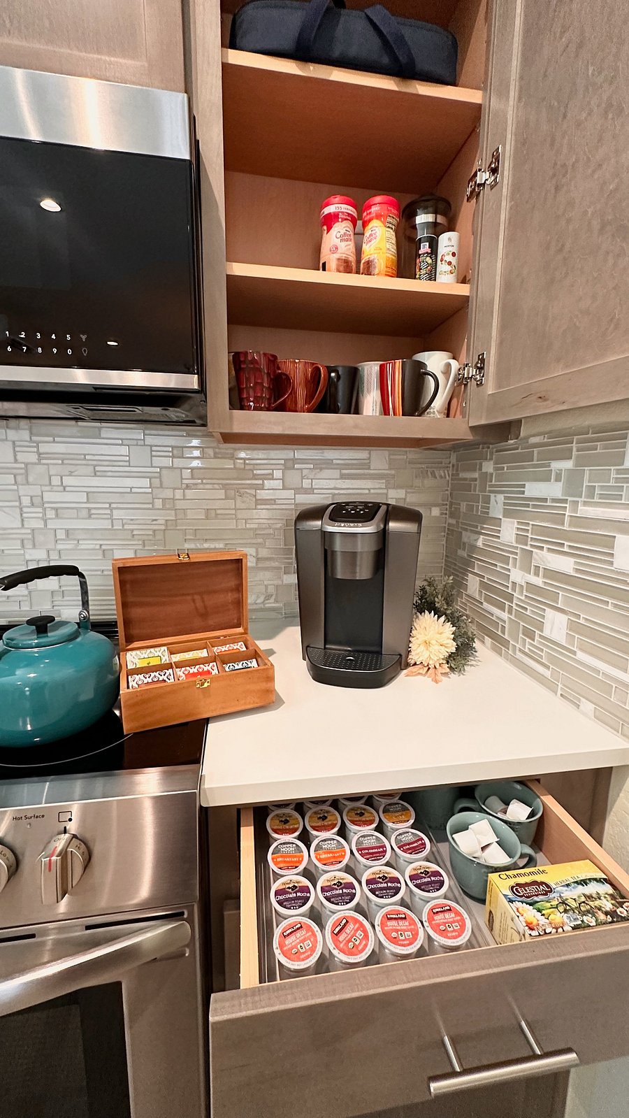 Coffee/tea Station with ample mugs and selection to get you started with beverages that make you feel right at home.