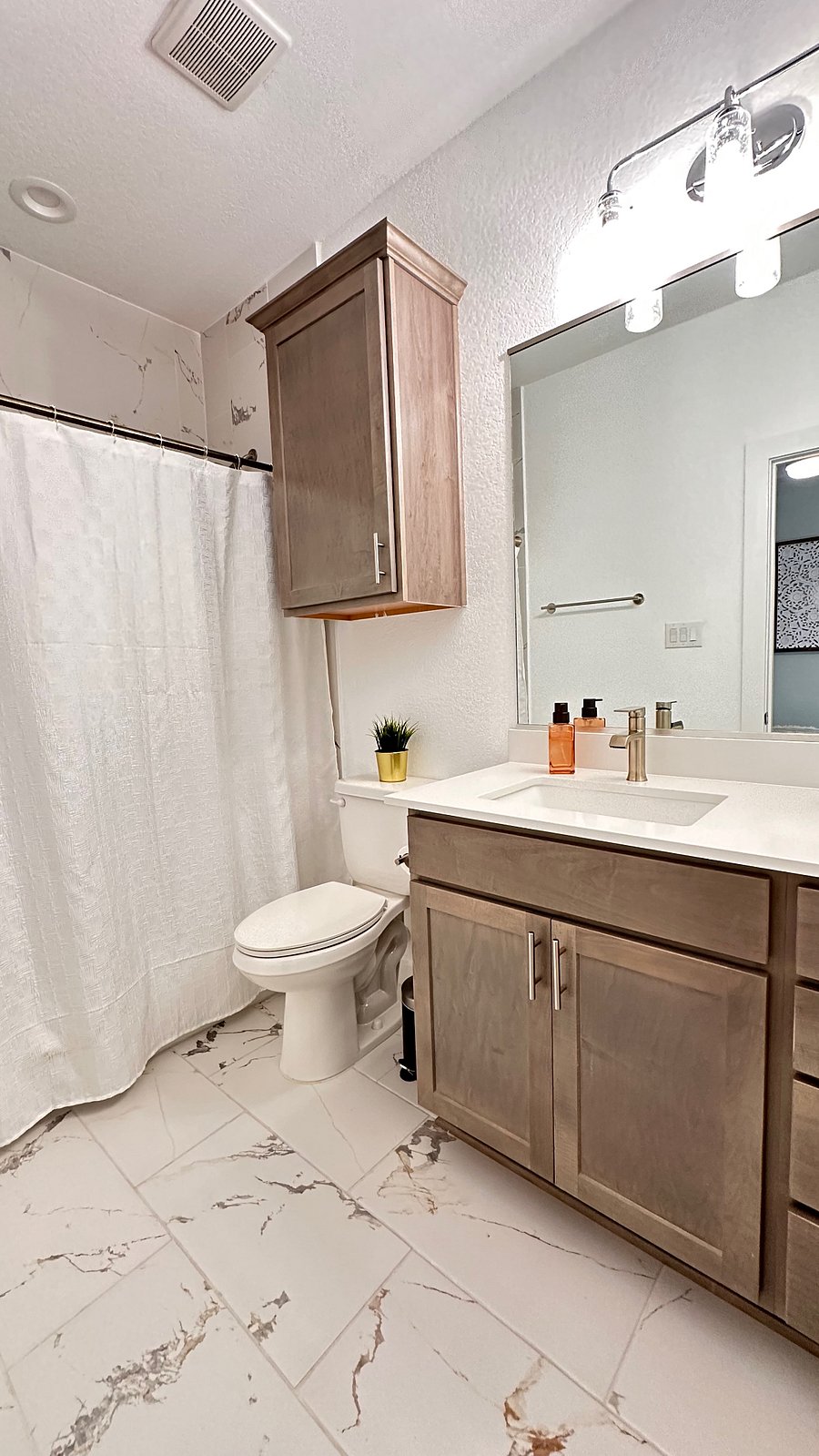 Every bathroom has cabinets for storing bathroom essentials.  Basic hairdryer, hand soaps, and hand towels are provided in each bathroom.