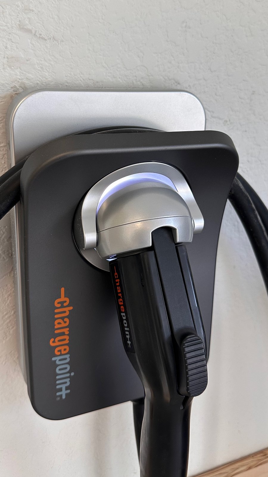 Free use of Level 2 EV charger for approved vehicles in the private garage.  