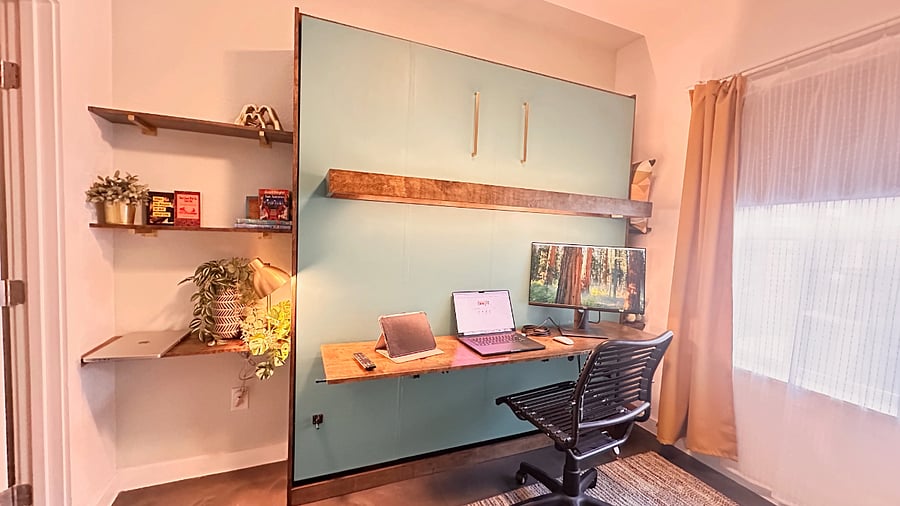 Office/1st floor bedroom:  King sized murphy bed closes up to reveal a large fold up desk with outlets and charger ports to support all your devices!  Dimmable desk lighting doubles as under-bed lighting when the bed is open.

