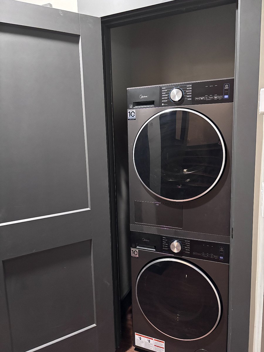 Laundry located in downstairs closet.
