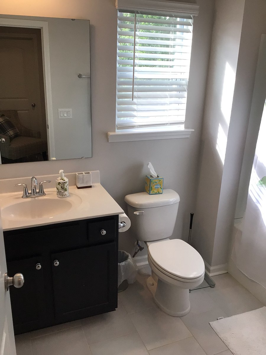 Full bathroom with under sink storage