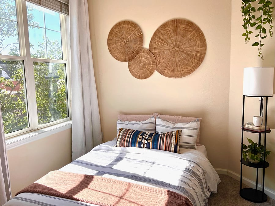 Second bedroom with full bed that folds into couch for added floor space