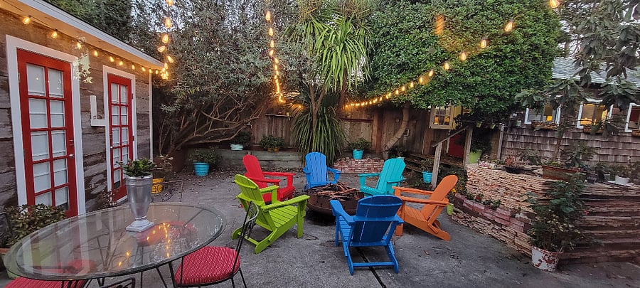 The back courtyard comes complete with maintenence- free Adirondack chairs and this back patio provide a respite for those wanting to enjoy quiet nights with a glass of wine. Or gather around the firepit with your friends or NEW 1st Ave neighbors.