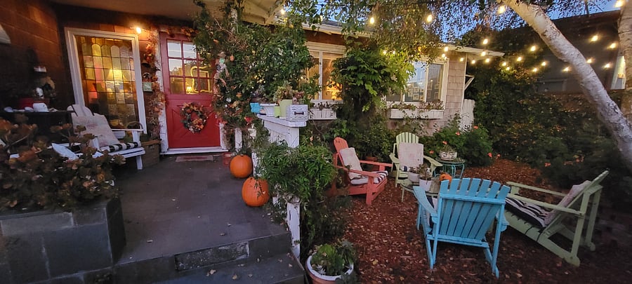 The front courtyard is an inviting place to enjoy a glass of wine with friends
