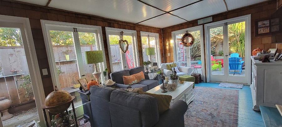 Another view of the sunroom/ family room, heading out into the back courtyard