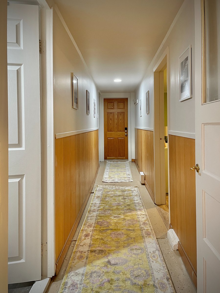 Private entry with bluetooth key-code entry lock. Motion-sensor flood light outside.