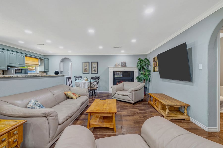 Bright & Spacious Living Room with Large TV