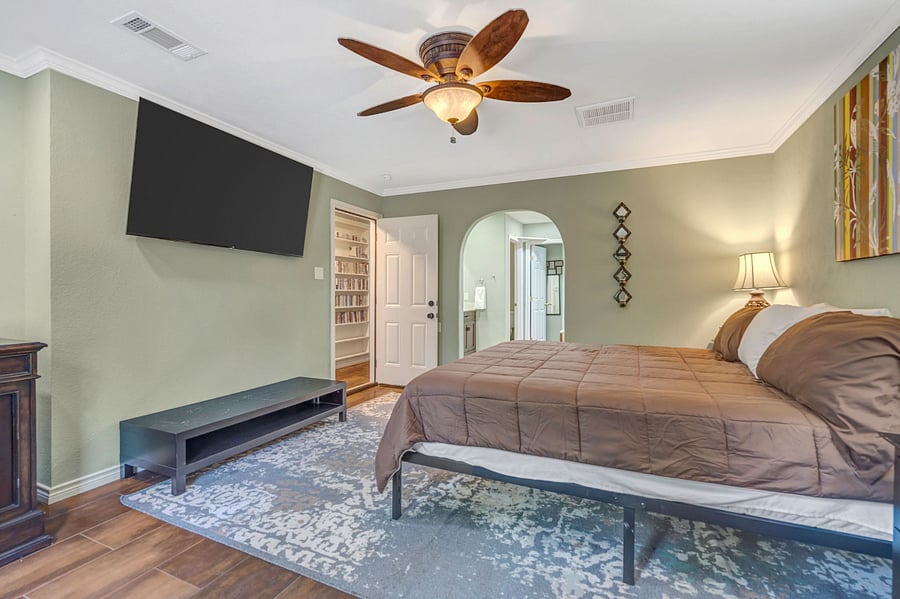 Primary Bedroom  California King Bed, TV, Desk, Kitchenet with private entrance.