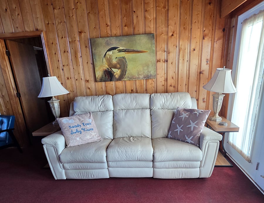 Sofa reclines on both sides, has charger ports available as well.