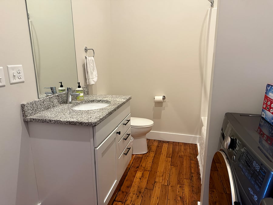Large capacity washer and dryer next to the Master Bath.