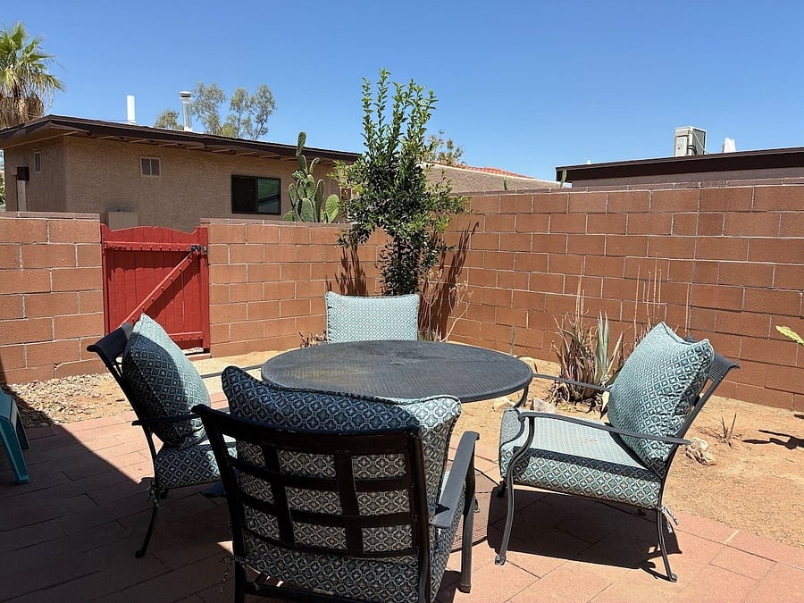 Another image of the walled in backyard.