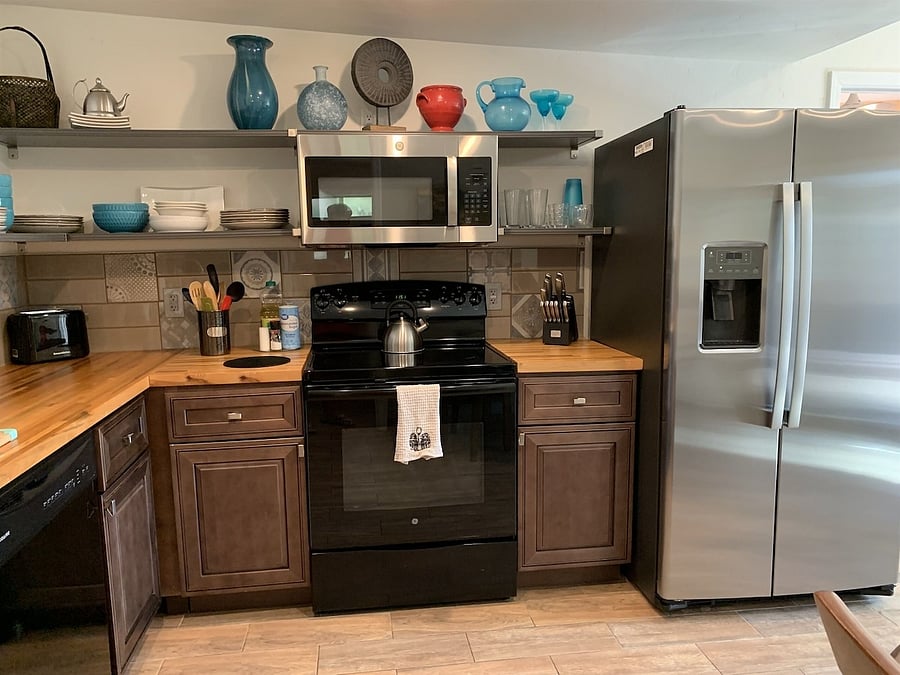 Kitchen. Stocked with all you need to prepare meals. Just bring food!
